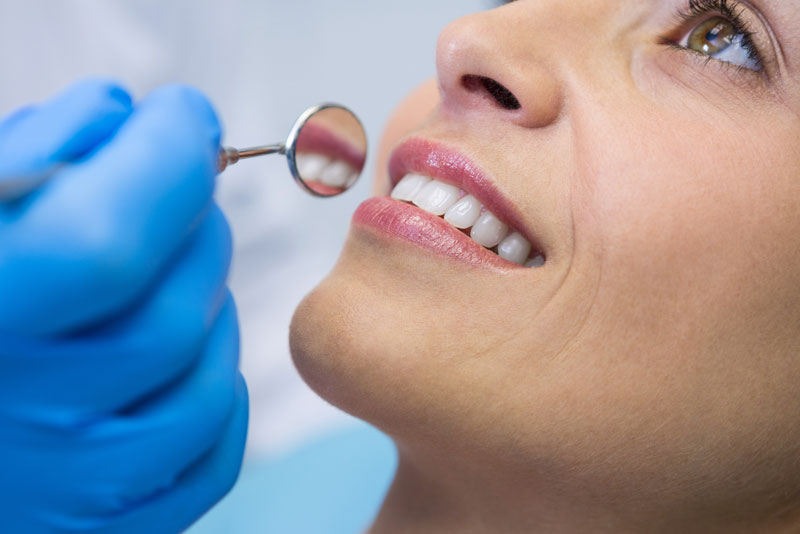 a dental patient being prepped for dental implant surgery.