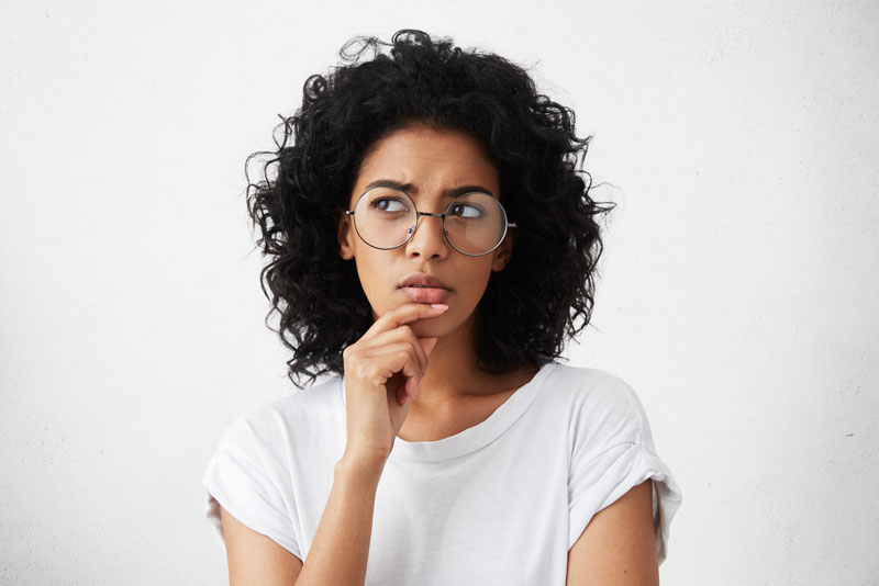 a dental implant patient curious about her candidacy for dental implants.