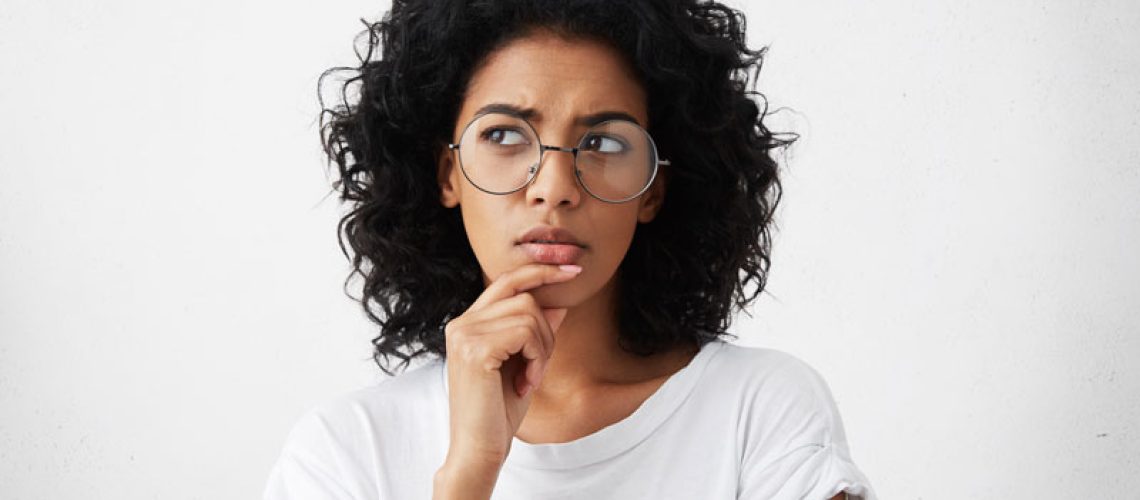 a dental implant patient curious about her candidacy for dental implants.